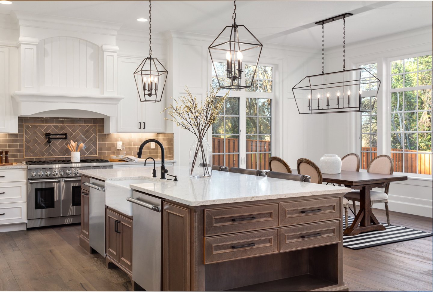 a kitchen with a table and chairs and a table