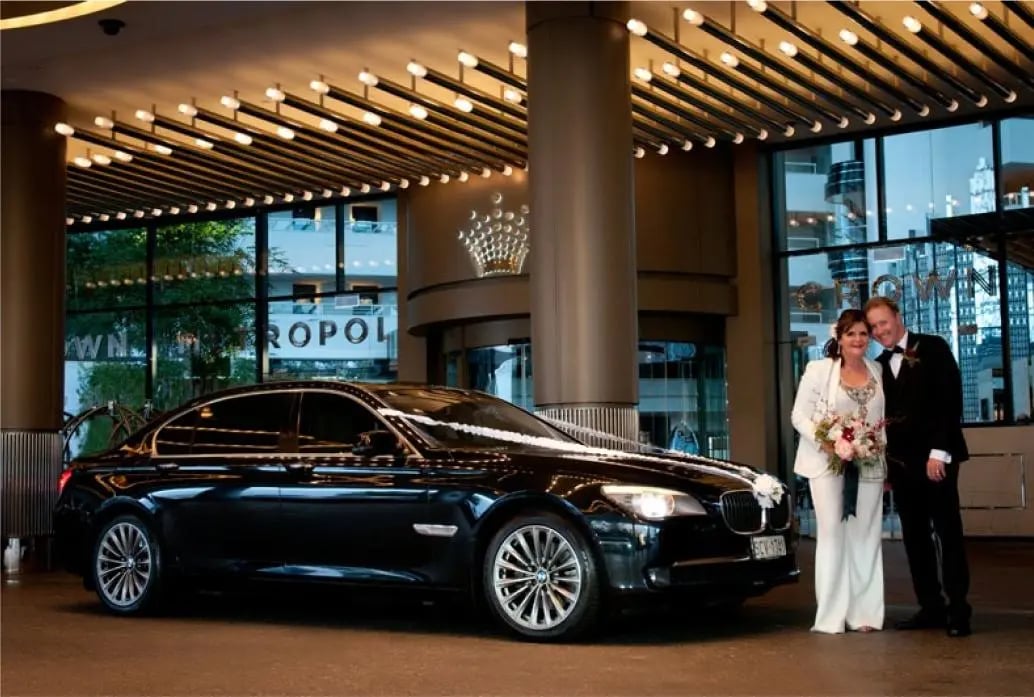 Luxury wedding chauffeur service with premium black vehicle