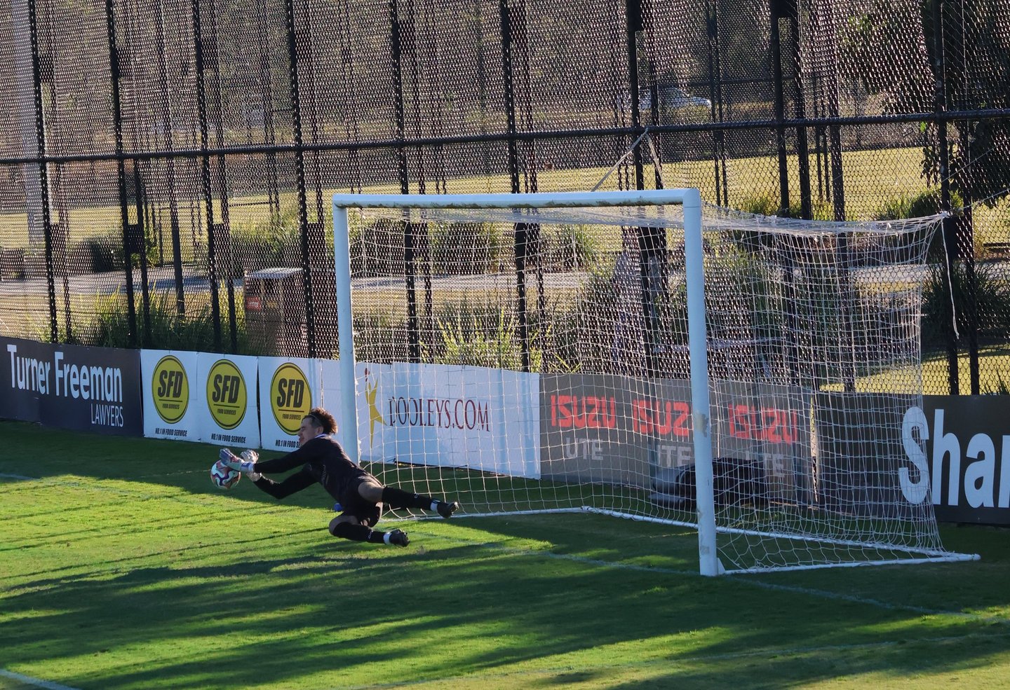 Keeper Daniel Solsky saves a penalty away to Western Sydney Wanderers