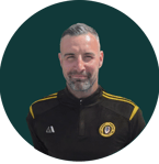 a man with a beard and a black jacket