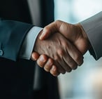 business men shaking hands signaling trust and being legit