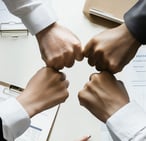 four founders fistbumping at company creation
