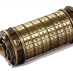Metal Cryptex scroll puzzle with rotating letter rings and hidden compartment inside