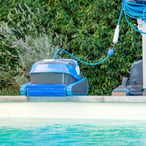 a blue and white robotic automatic pool cleaner