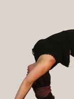 rachel back bend black outfit white background