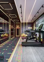 an elegant modern gym room with a treadmill and a fitness accessories