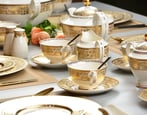 Golden Dining Premium crockery for rent provided by Royal Crockery and Counters