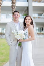 A smiling couple captured by Los Cabos Wedding Films at the luxury Garza Blanca Hotel in San José del Cabo by our professiona