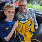 Henry Westwell (with Dad Dan) winner of the signed shirt Harrogate (22/10/23).