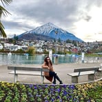 Thun: Where Lake Meets Mountain.The image captures the stunning scenery of Thun, a town in Switzerland where the picturesque 