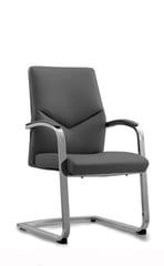 Mavis mid-back chair with sloped arms and chrome sled base, side view