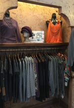 clothing rack and painted walls