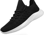 a black and white sneakers with a white sole sole