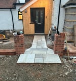 brick wall being built at a malvern home