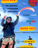 An image of a girl promoting a paragliding offer (Price: 600 DH, logo, address, and website)