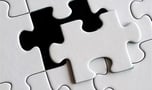 a puzzle piece of puzzle pieces with a black and white puzzle piece