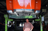 Dad Under Red Truck