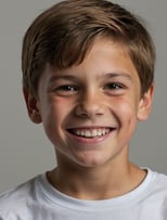 real portrait of a young boy with a toothbrush