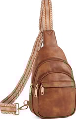 a brown leather backpacker with a brown strap
