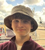 person in hat
