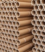 a stack of  bunch of paper tubes