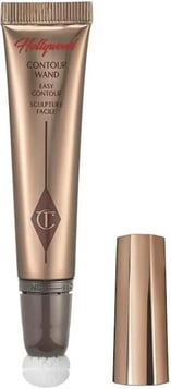 a close up of a bottle of liquid liquidCharlotte Tilbury Hollywood Contour Wand Light-Medium