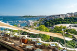 a view of a restaurant with a view of the water