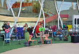 a band playing music in a large outdoor area