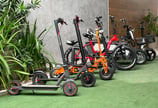 a row of scooters with scooters and scooters