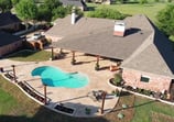 Outdoor Living Space with Pool in a Backyard