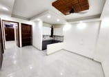 Living Room with Open Kitchen of 2 BHK Modern Builder Floor with Balconies — Chattarpur