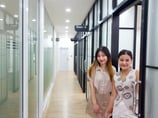 Ms. Fah & Ms. Kaning with Sanet New Building