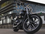a motorcycle parked in front of a building