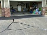Apron repair with hot rubber crack seal