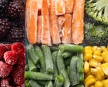 a variety of fruits and vegetables in a tray