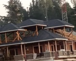 Construction of home stays 2nd and 3rd floor with wooden truss by escotten infra projects pvt. ltd.