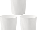 three white pleated paper cups with pleated plea