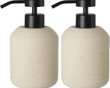 two soap dispensers with soap dispensers