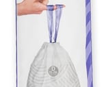 a bag of food bags with a hand holding a plastic bag