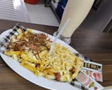 Salchipapas en Delipizza Cajamarca