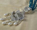 a Silver look trending necklace with pearls