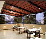 Modern dining room with warm lighting and comfortable seating