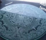 grabado en vidrio de calendario azteca