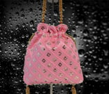 a pink sitara potli purse bag