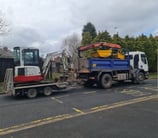grabber and mini digger on a site in west brom