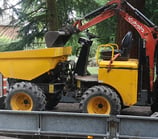 Vibrating roller compacting base layer in Stourbridge driveway