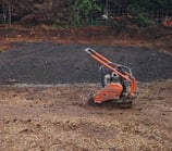 Petrol wacker plate compacting sub-base in Stourbridge
