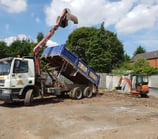 grabber and mini digger on a site in west brom