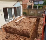 Foundation excavation underway in Birmingham building site
