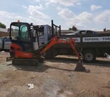 Compact digger on tight access site in Stourbridge